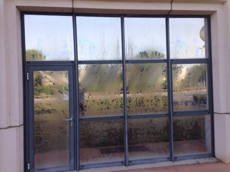 Pose de film protection solaire vitrage de bureaux à Aix les Milles